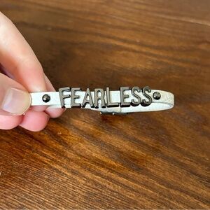 White leather Fearless bracelet mantra Taylor Swift concert